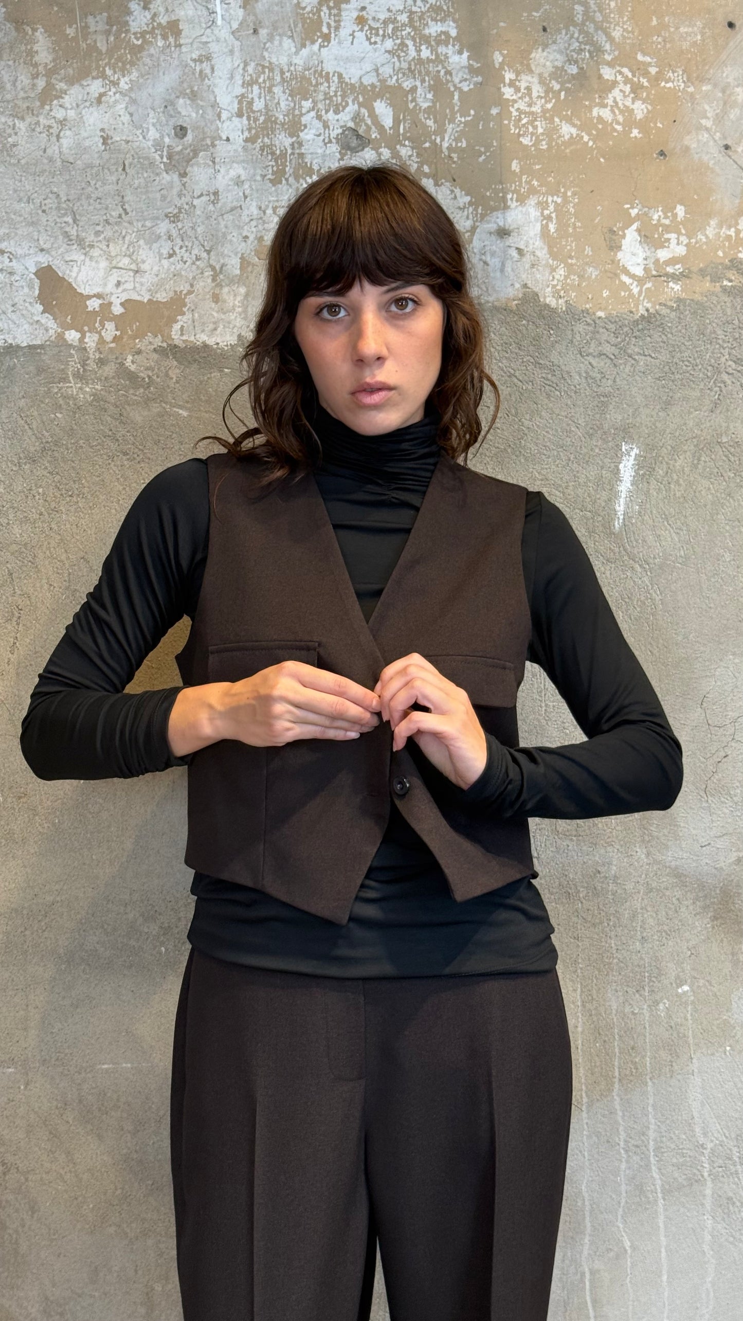 Gilet cinturino e tasche