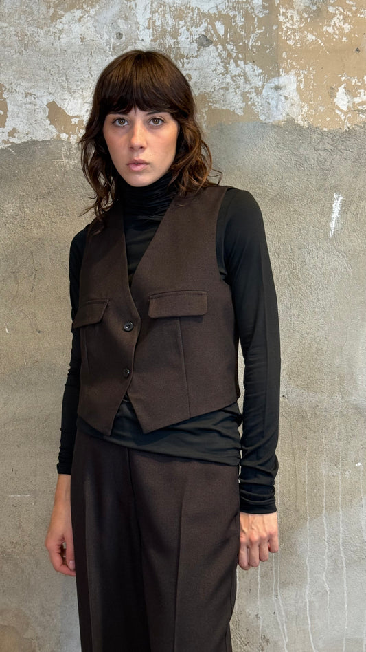 Gilet cinturino e tasche